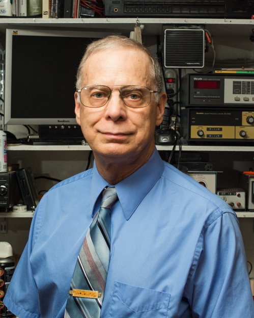 Charles Legg in blue shirt and tie